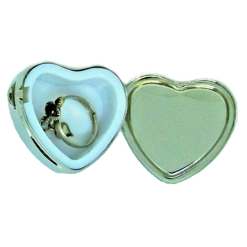 small heart-shaped enamel pill box